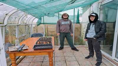 The boys in the clean and tidy conservatory 